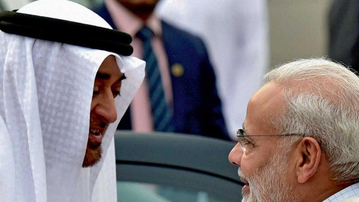 Sheikh Mohamed sharing a light moment with Narendra Modi during his reception at Delhi airport on Tuesday. 