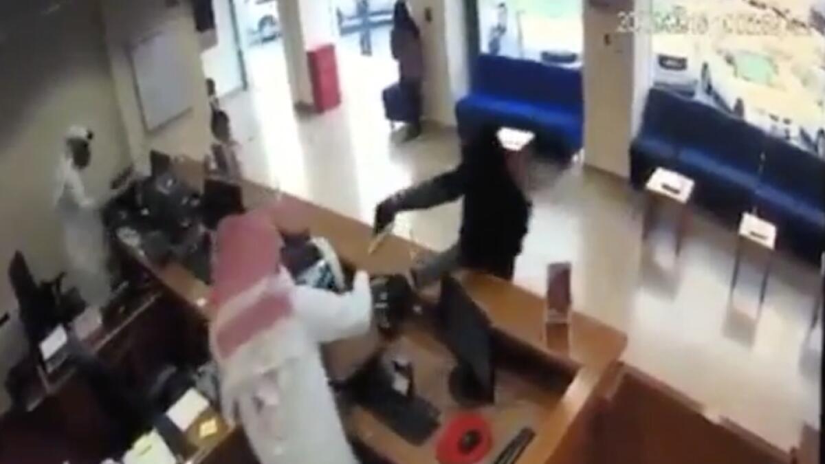 Video: Man dressed in burqa robs bank in broad daylight with toy gun