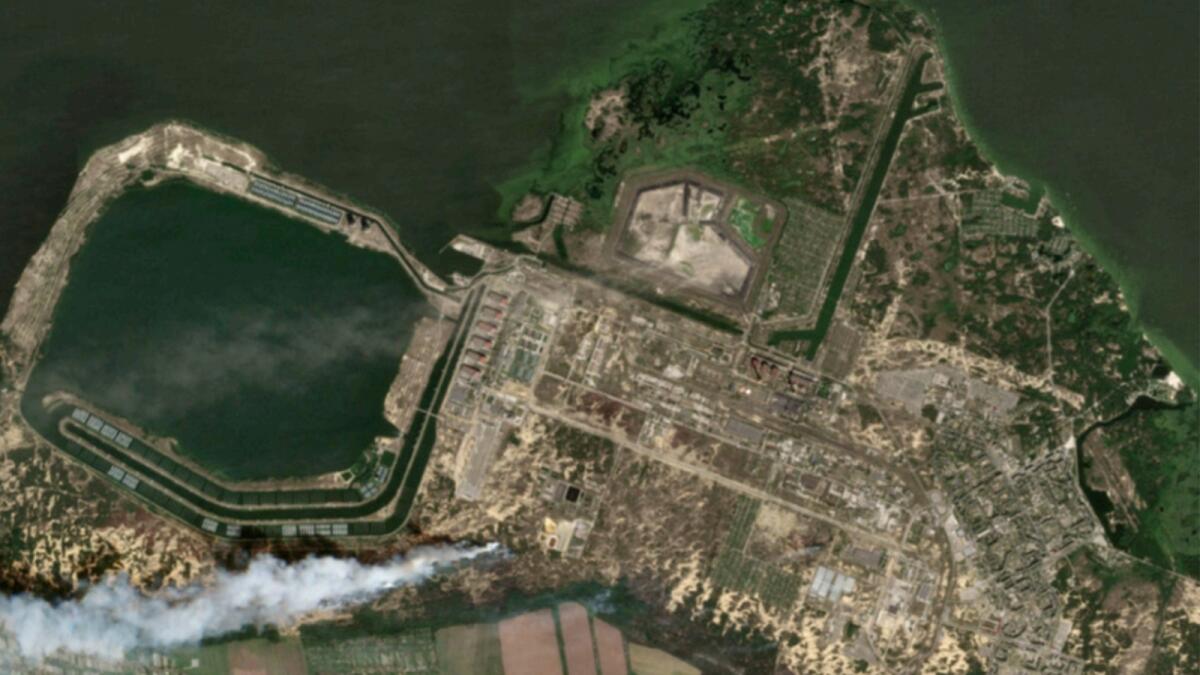 Overview of Zaporizhzhia nuclear power plant and fires, in Enerhodar. — Reuters