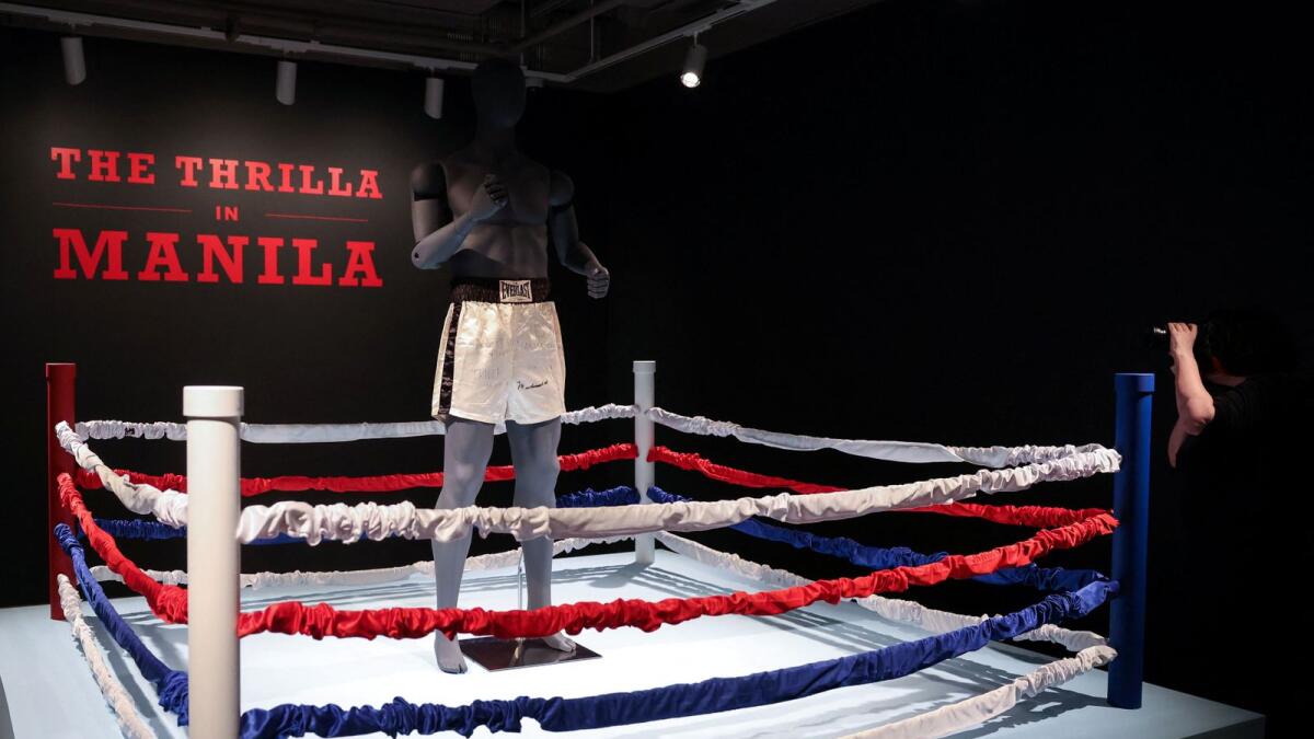 Muhammad Ali's boxing trunks from the 1975 'Thrilla in Manila' boxing match with Joe Frazier expected to be auctioned for  $4 to $6 million, stand on display at Sotheby's auction house in New York City, U.S.. - Reuters