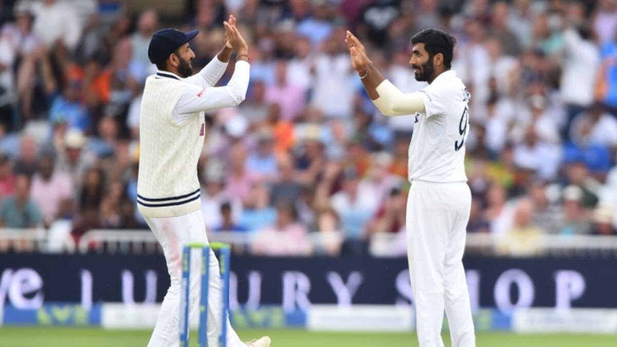Jasprit Bumrah (right) took four wickets for India. (BCCI Twitter)