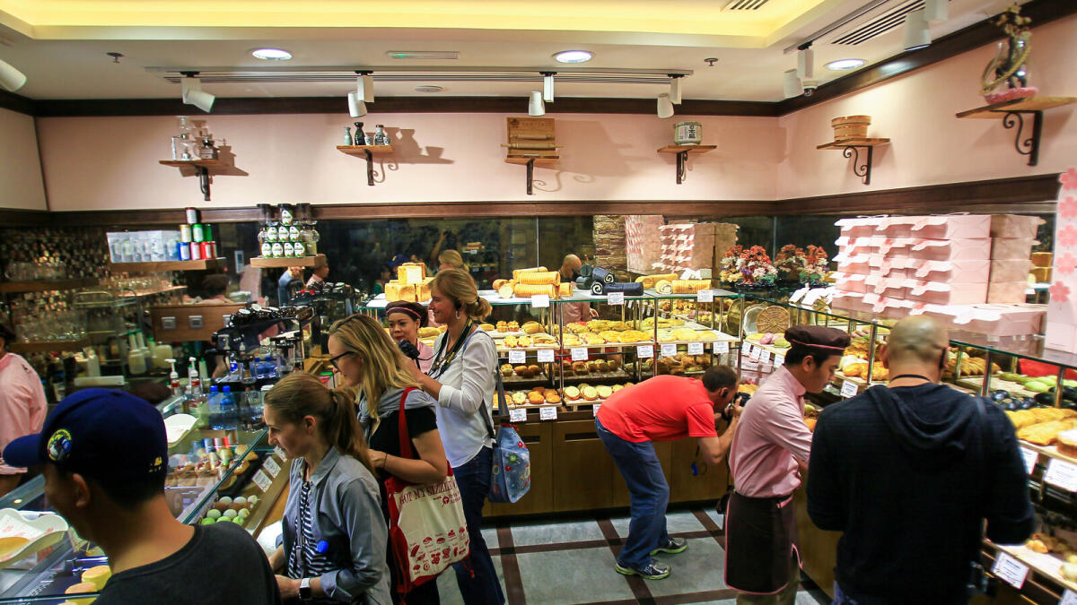 Visitors choosing their desserts at Yakitate
