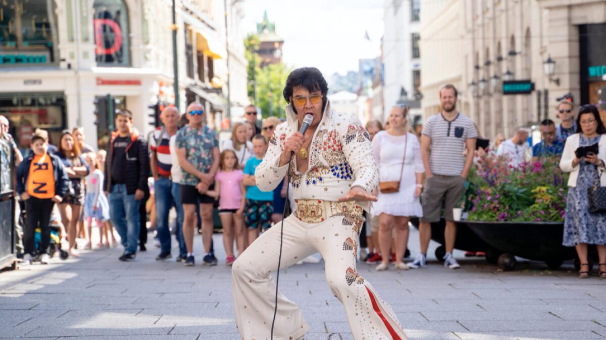 Norwegian artist Kjell Elvis (Kjell Henning Bjørnstad) performs in central Oslo in an attempt to beat the record of the world´s longest Elvis Presley singing marathon in Oslo. His plan is to perform continuously for 50 hours, ending Saturday morning. Photo:  AFP&lt;p&gt;&lt;/p&gt;&lt;p&gt;&lt;/p&gt;(Research done by Fakhar Ul Islam/KT)