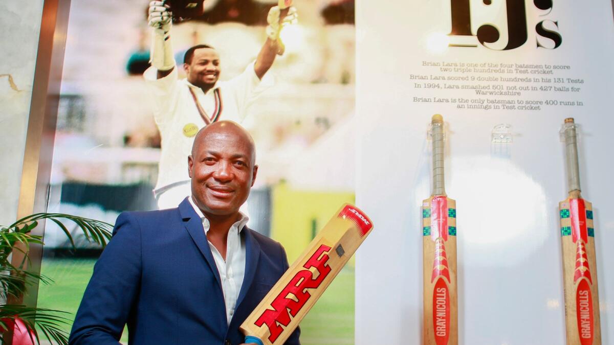 Brian Lara poses during the unveiling of his three bats with which he played the legendary knocks of 375, 400 not out and 501 not out. These three bats will be on display for a month at the TJ's, a sports cafe in Dubai. (Photo by Shihab)
