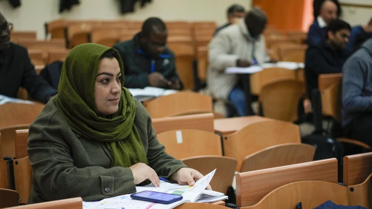 Batool Haidari attends an Italian language class in Rome on  December 5, 2022. — AP