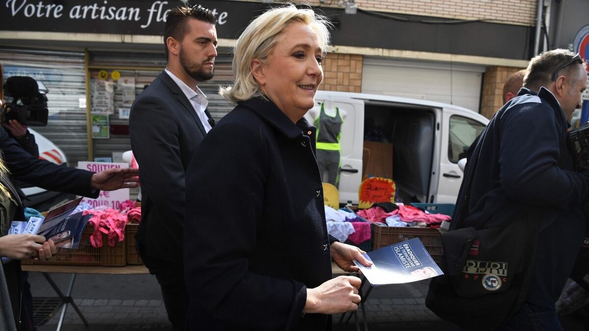 Le Pen steps down as party leader