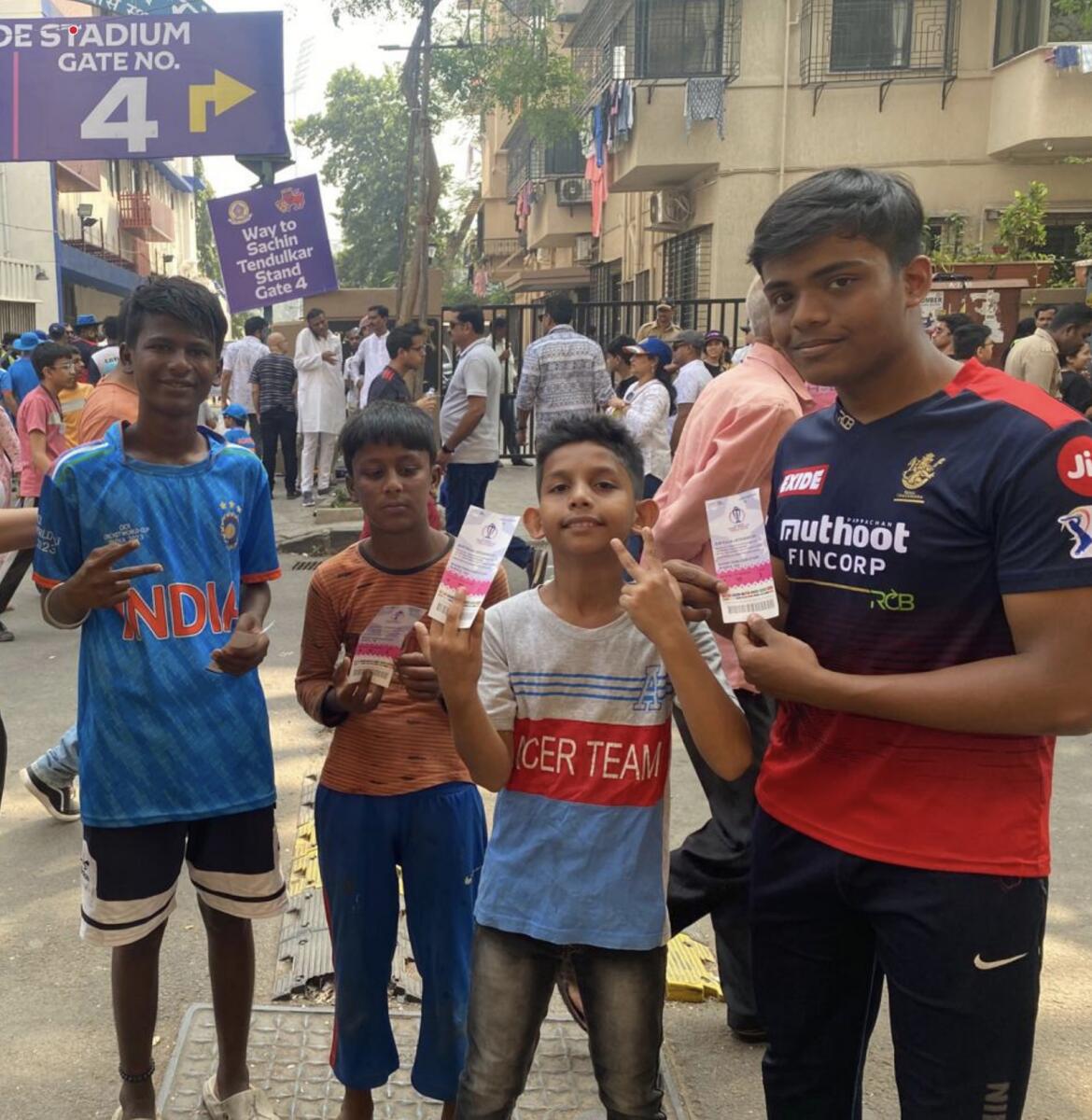 The Mumbai kids pose with their tickets