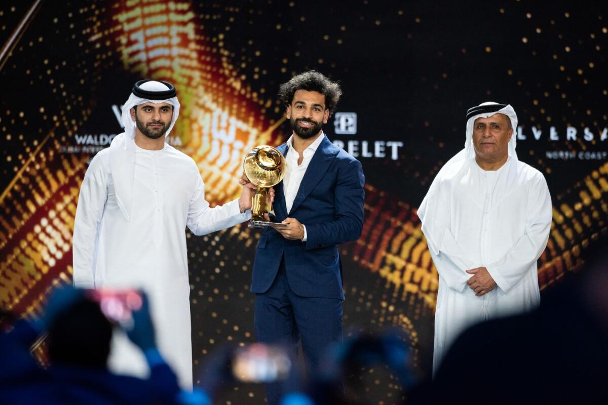 Sheikh Mansoor bin Mohammed bin Rashid Al Maktoum, Chairman of the Dubai Sports Council, presents Mo Salah the TikTok Fans' Player of the Year award. Supplied photo