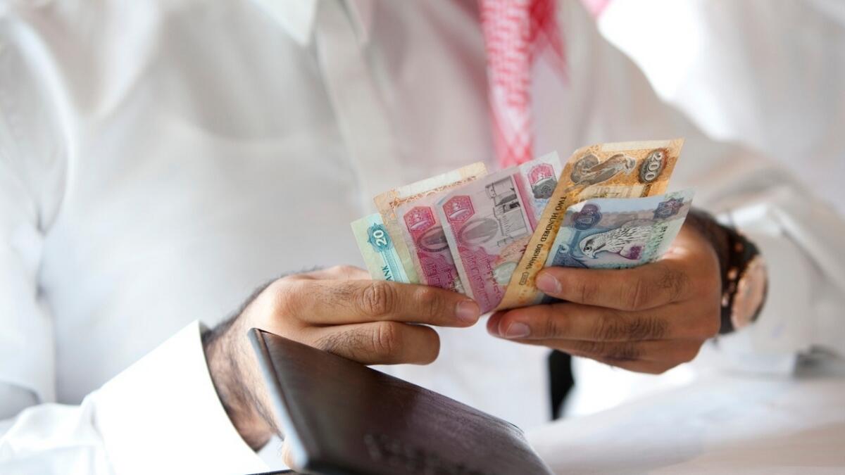 Forcing employees to sign fake pay slips showing that they received their salaries -- Dh5,000 per employee.