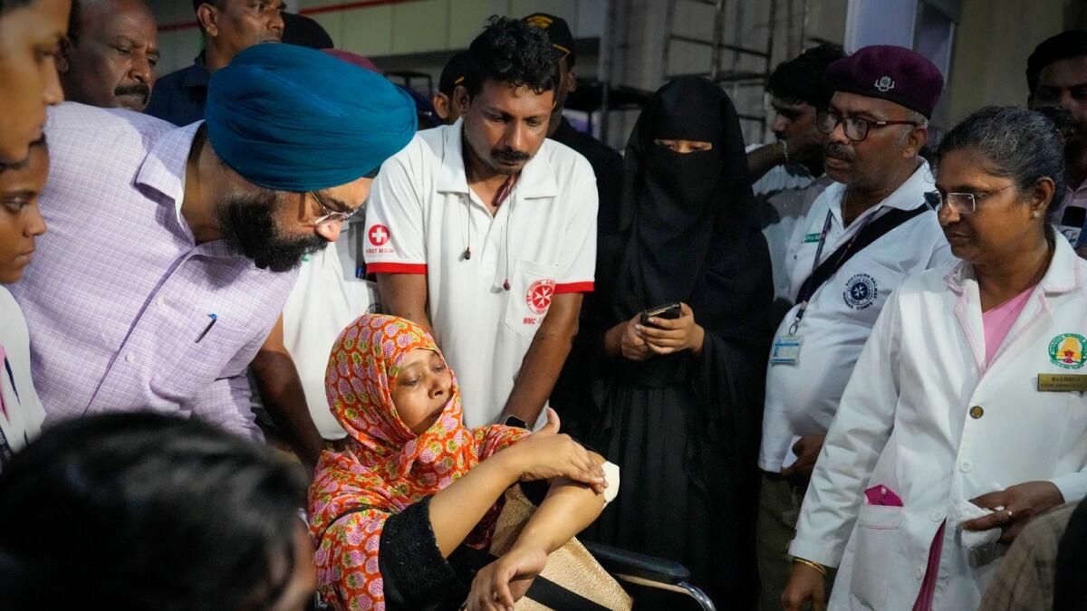 An injured passenger who was on the Coromandel Express that met with an accident in Odisha being given medical assistance at Central railway station in Chennai on Sunday. -- PTI