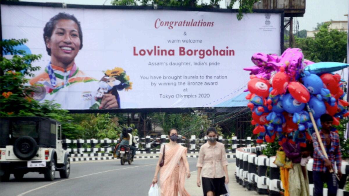 A hoarding of Olympic bronze medalist boxer Lovlina Borgohain in Guwahati. — ANI