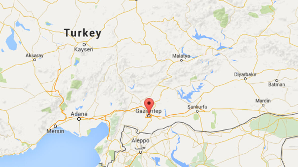 Car bomb in Turkey kills policeman, 13 wounded