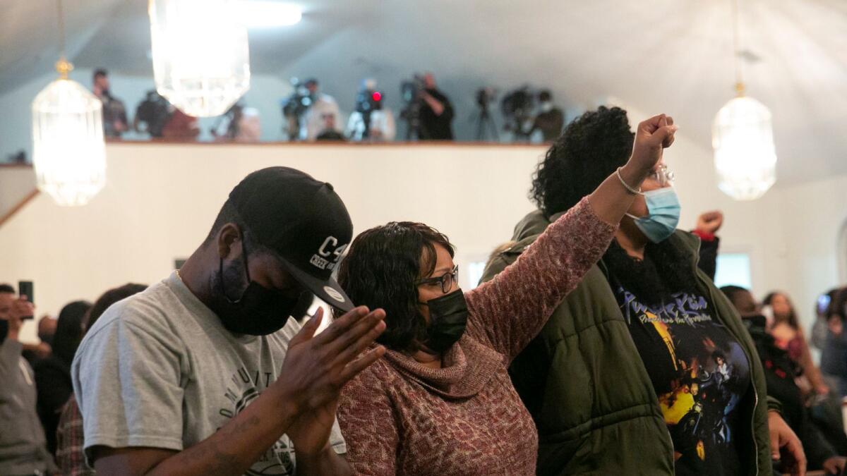 People react during a news conference on Jason Walker's death on January 13, 2021, in Fayetteville, North Carolina.(Photo: AFP)