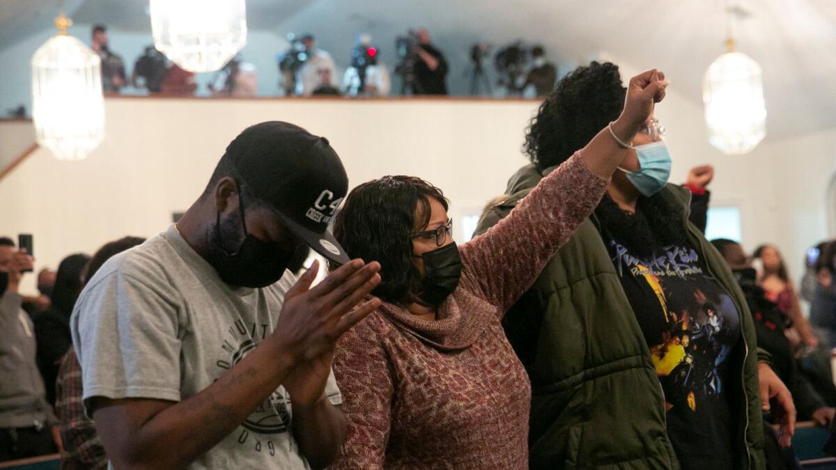 People react during a news conference on Jason Walker's death on January 13, 2021, in Fayetteville, North Carolina.(Photo: AFP)