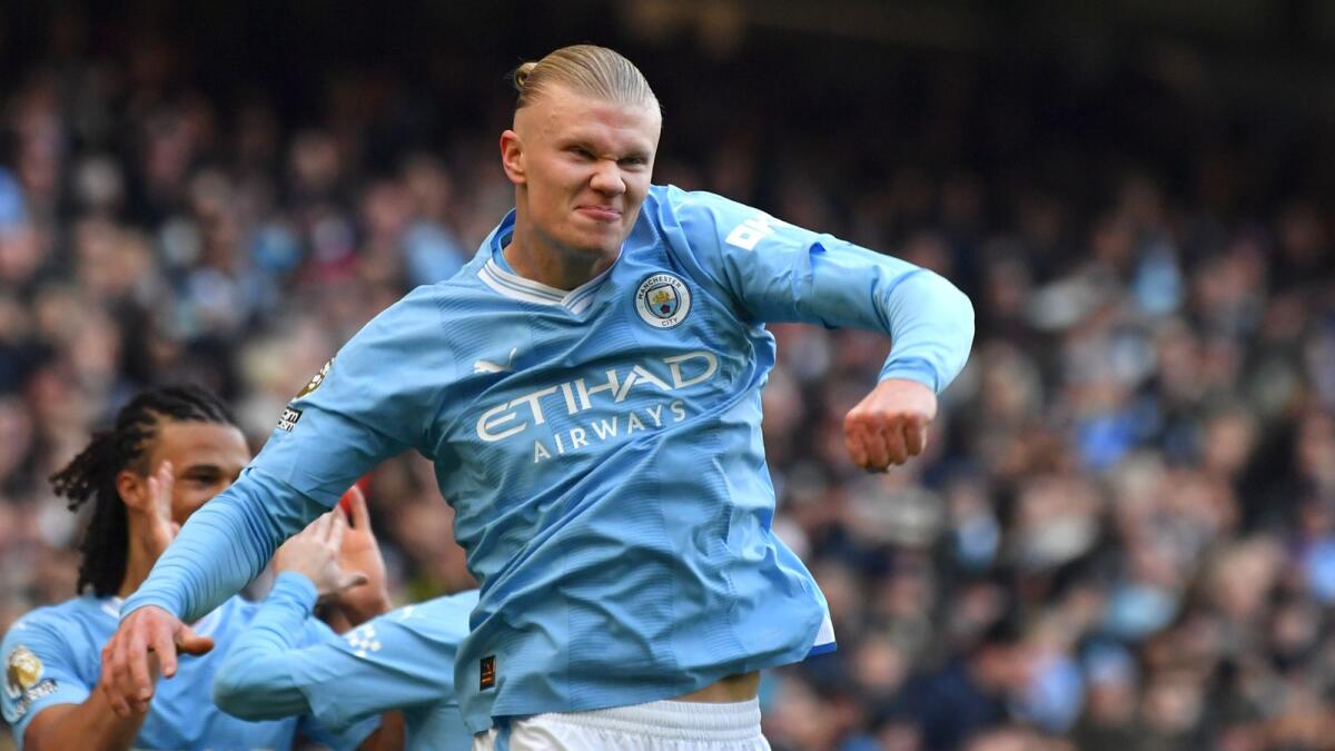 Manchester City's Erling Haaland celebrates after scoring against Liverpool at the Etihad stadium in Manchester on Saturday. — AP