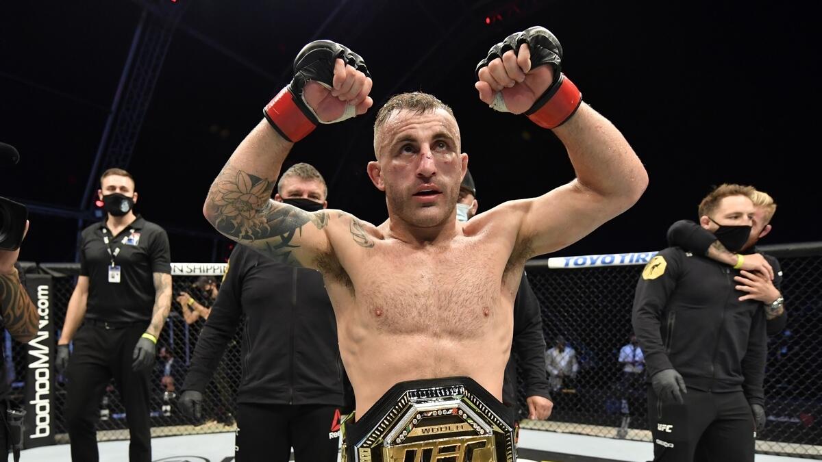 Alexander Volkanovski of Australia celebrates after his split-decision victory over Max Holloway in their UFC featherweight championship fight. (Reuters)