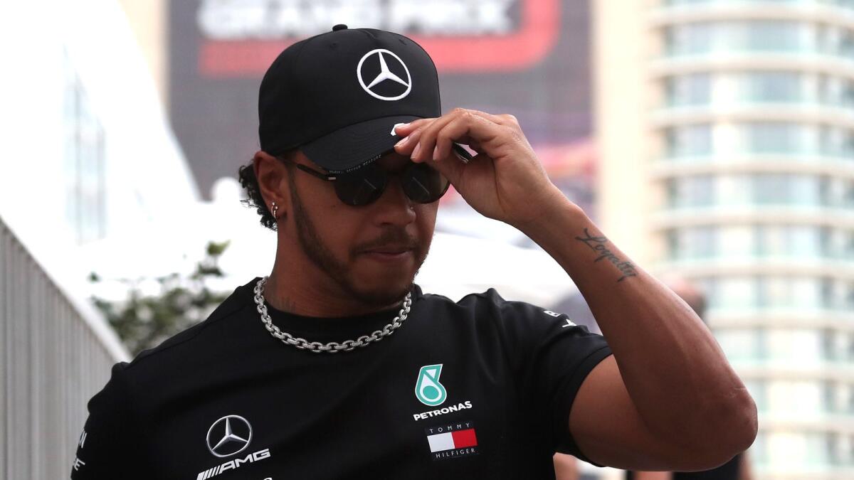 Lewis Hamilton had already arrived in Abu Dhabi after completing quarantine in Bahrain. — Reuters