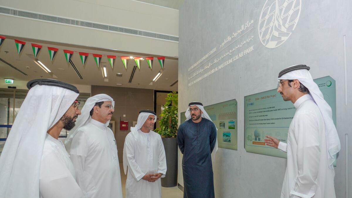 Saeed Mohammed Al Tayer, MD &amp; CEO of Dewa, with other senior officials. - Courtesy: Dubai Media Office