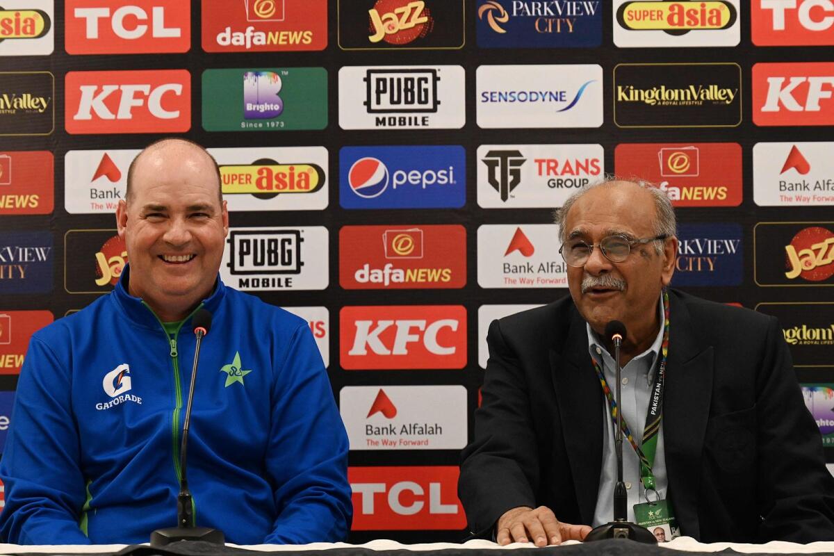 Mickey Arthur (left) and Pakistan Cricket Board's management committee chairman Najam Sethi in Rawalpindi on Thursday. — AFP