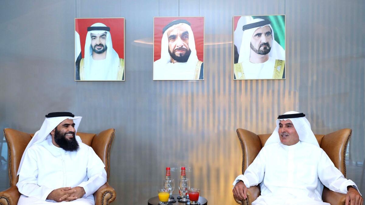 Abdul Aziz Al Ghurair, Chairman of Dubai Chambers, and Mana Ahmed Al Kaabi, Chairman of the Hatta Traders Council, exchanging views during the meeting in Dubai on Tuesday. — Supplied photo