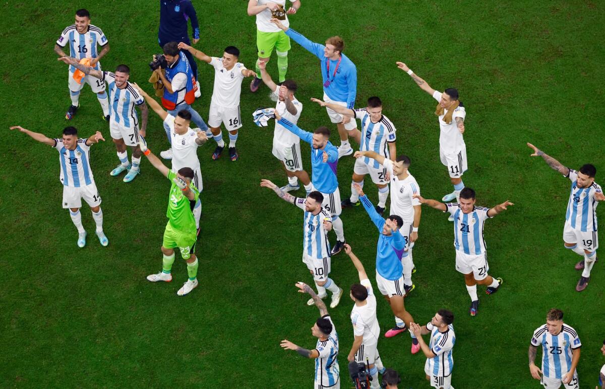 Argentina players celebrate after the match. Photos: Reuters