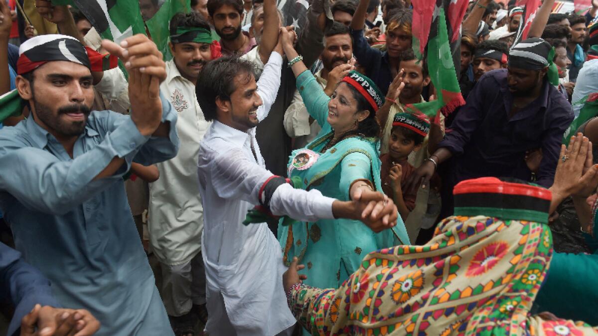 Supporters of Pakistan Peoples Party (PPP) at an election campaign rally in Lahore on July 19, 2018.