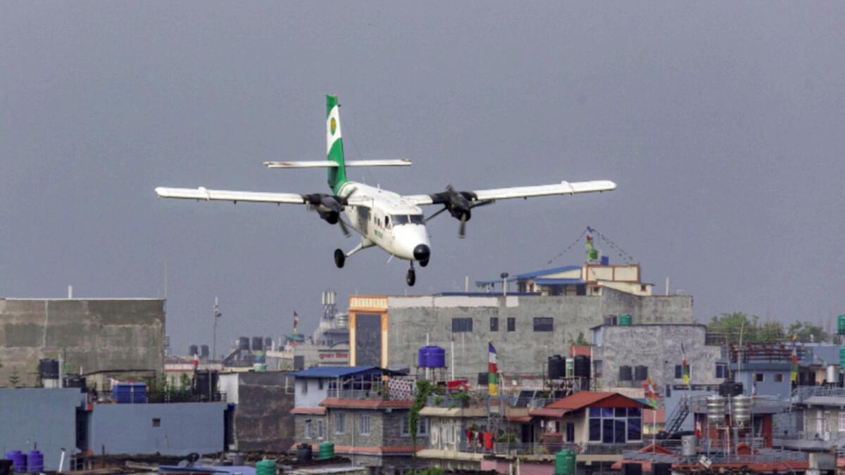 Tara Air's DHC-6 Twin Otter, tail number 9N-AET prepares to land at the airport of Pokhara in April. — Reuters