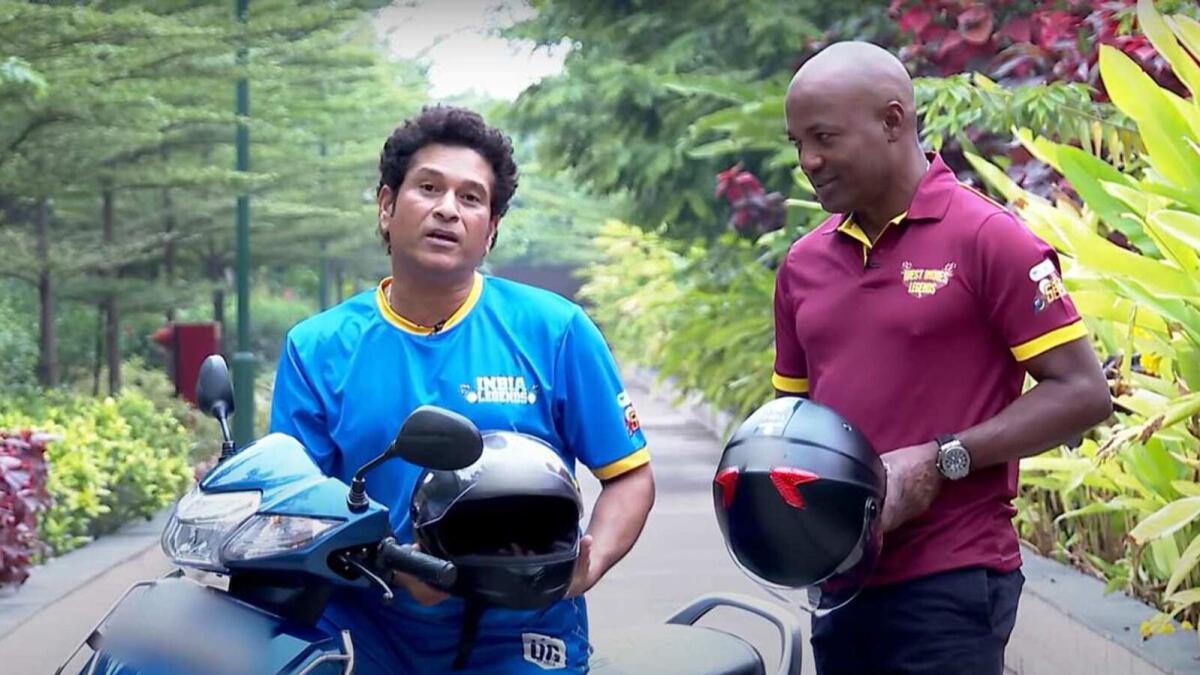 Sachin Tendulkar and Brian Lara advise two-wheeler riders to wear helmet. — Twitter