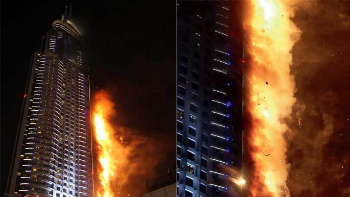 The fire, fanned by strong winds, quickly spread to the upper floors of the hotel. — Photos by Rahul Gajjar