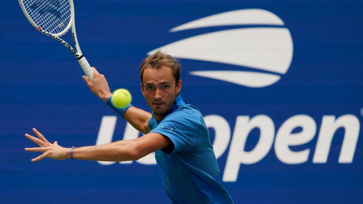 Daniil Medvedev hits a return during the match against Stefan Kozlov at the US Open.  (AFP)