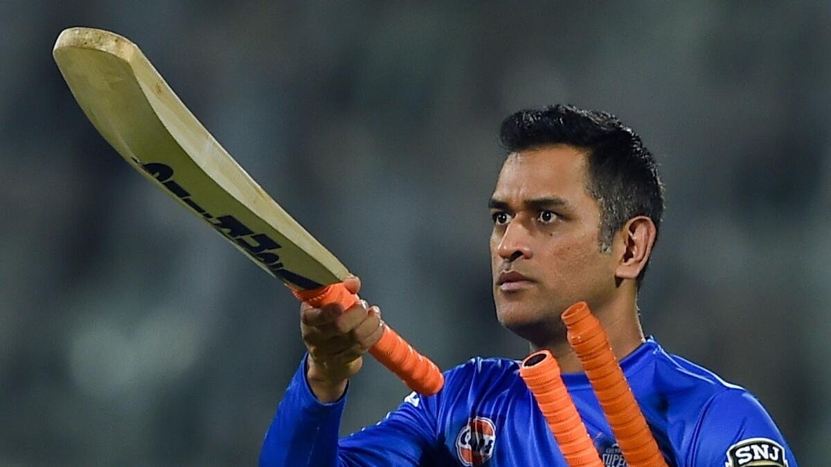 MS Dhoni holding cricket bats, Dhoni breaks silence on retirement