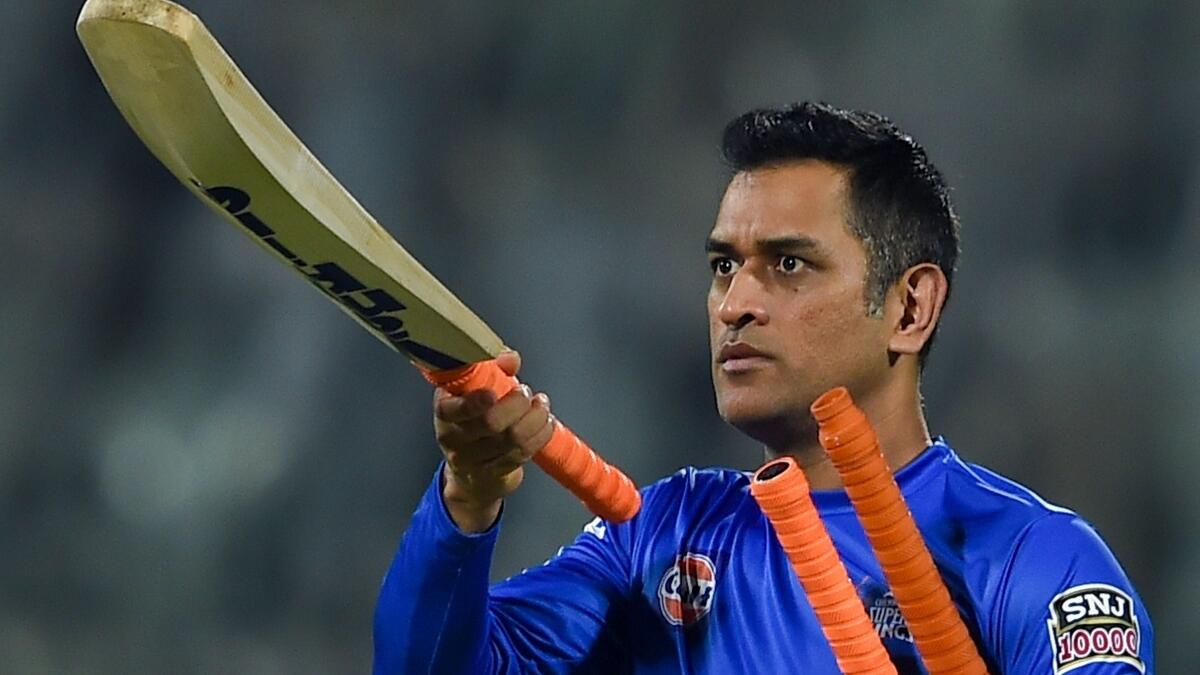 MS Dhoni holding cricket bats, Dhoni breaks silence on retirement