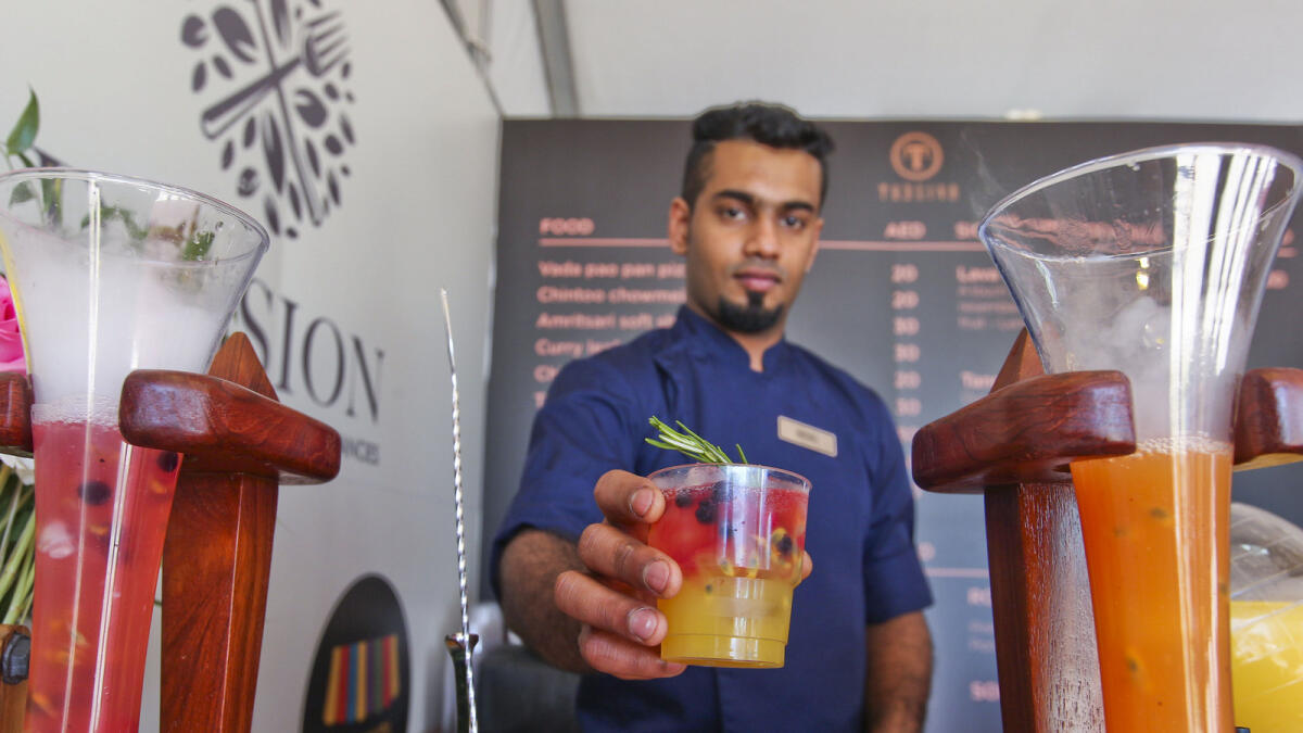 BOTTOMS UP ... Of course, after tasting various delights from around the world at the three-day Taste of Dubai event, you need a refreshing drink. Nigil Joy serves Lava Lamp, a refreshing concoction of mango, passion fruit, blackberry, red currant and garnished with rosemary.