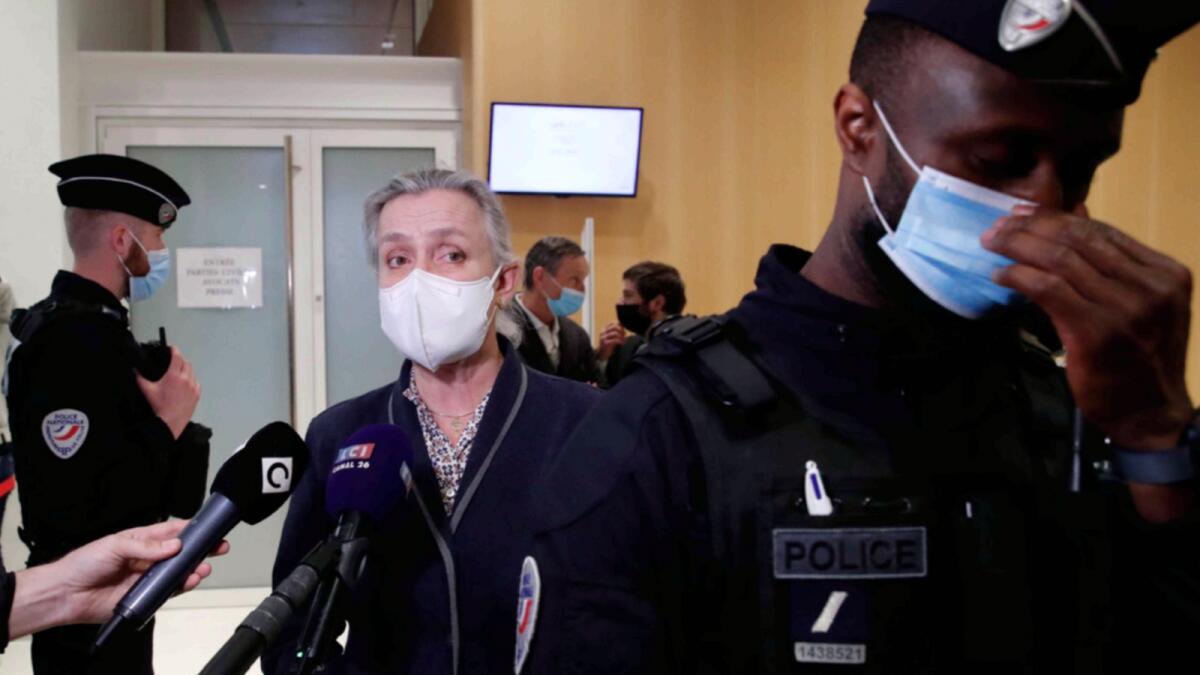 Doctor Irene Frachon, who discovered that the drug Mediator could have fatal side effect, speaks to reporters as she walks out at a Paris courthouse on Monday. — AP