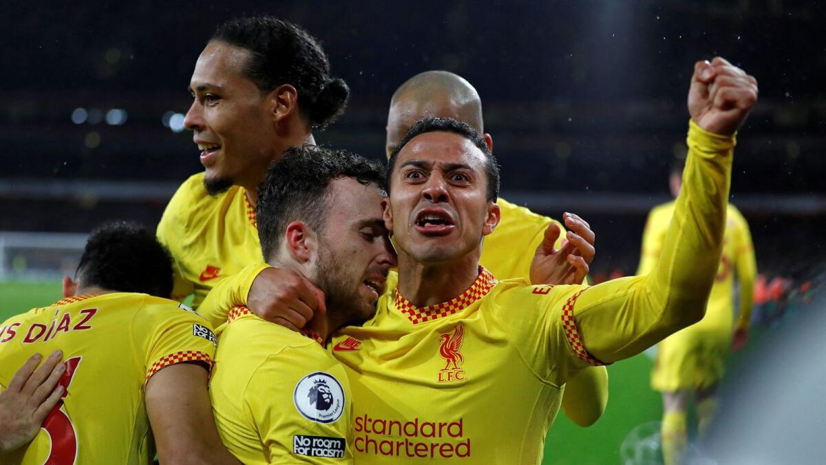 Liverpool's Diogo Jota celebrates his goal with teammates. (AFP)