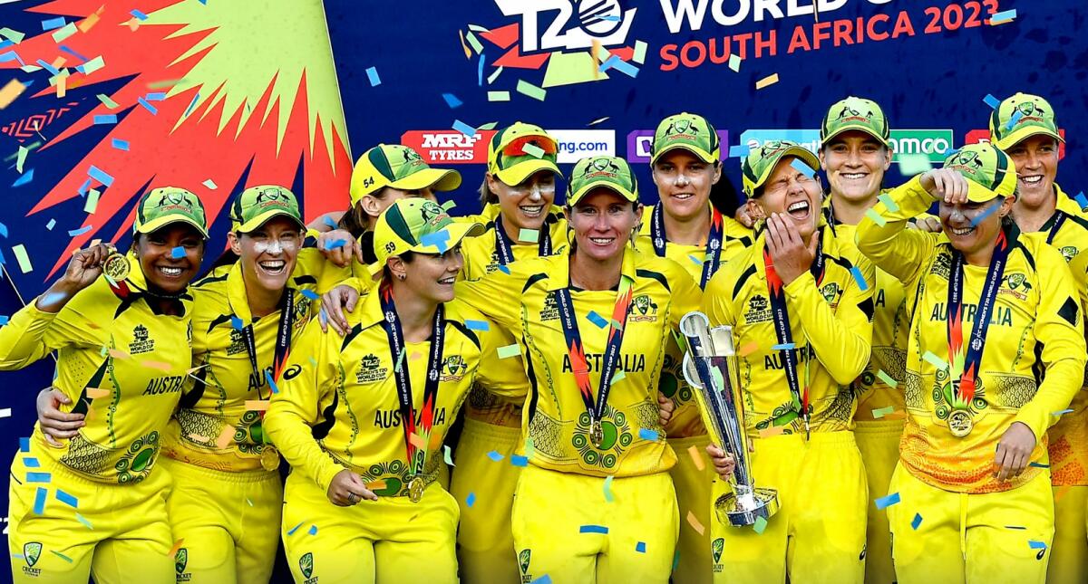 Australian women's team celebrate after winning the T20 World Cup. — ICC
