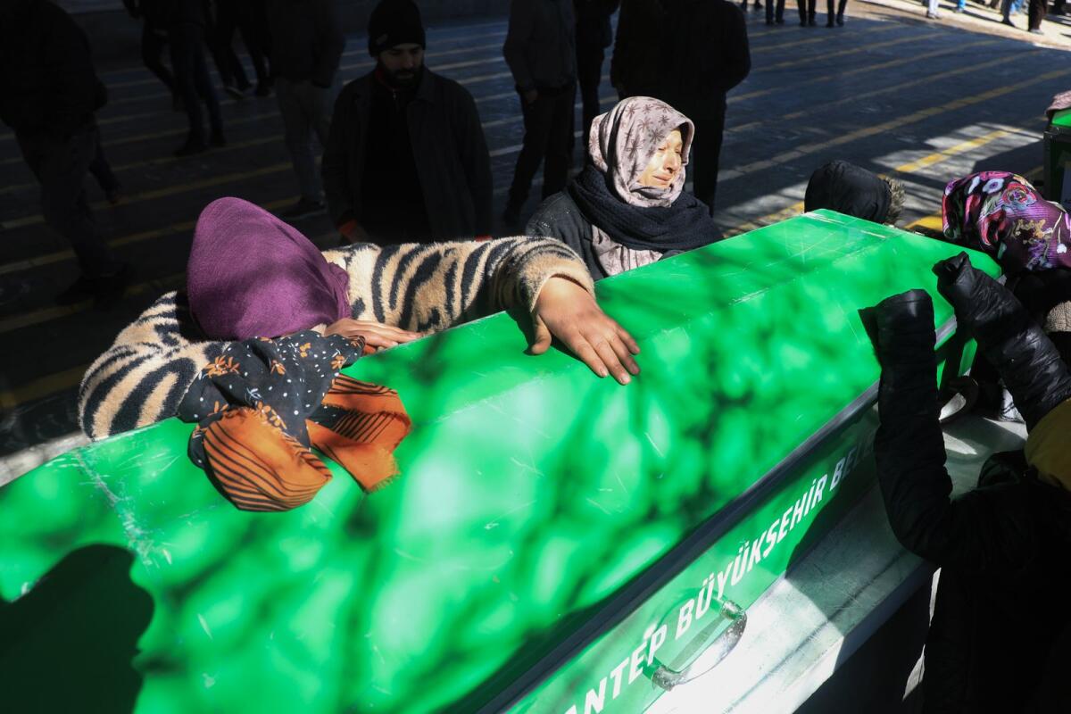 Relatives mourn victims. Photo: AFP