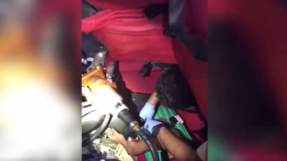 Video: Dubai Police cut open car to rescue trapped motorist