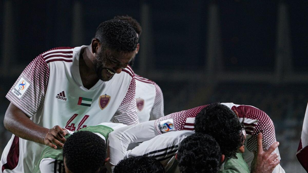 Al Wahda players celebrate a goal against Al Zawraa. — Twitter