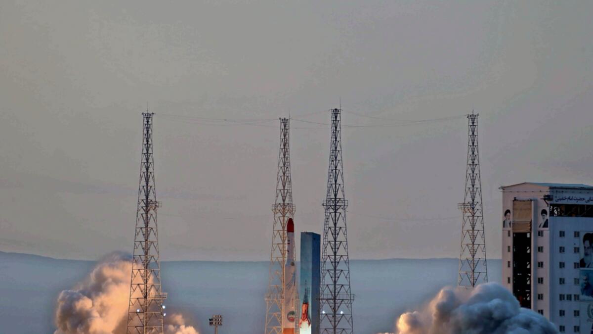 A file photo shows the launching of Simorgh, or 'Phoenix,' rocket in an undisclosed location in Iran on December 30. — AP file