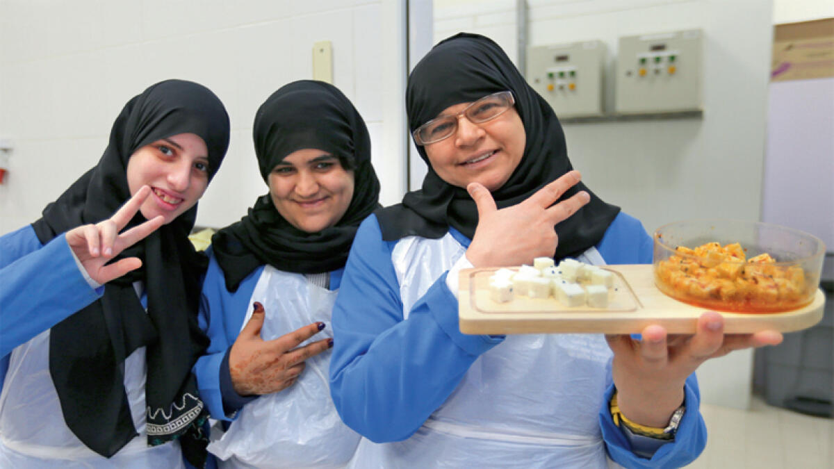 Staff at the farm’s quality control and testing centre are responsible evaluating the quality of its produce.