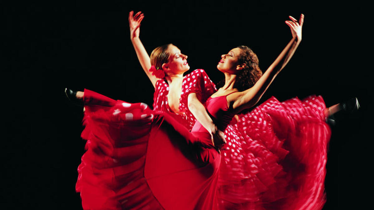 Spanish dancers pour their feelings  into rhythmic feet stomping 