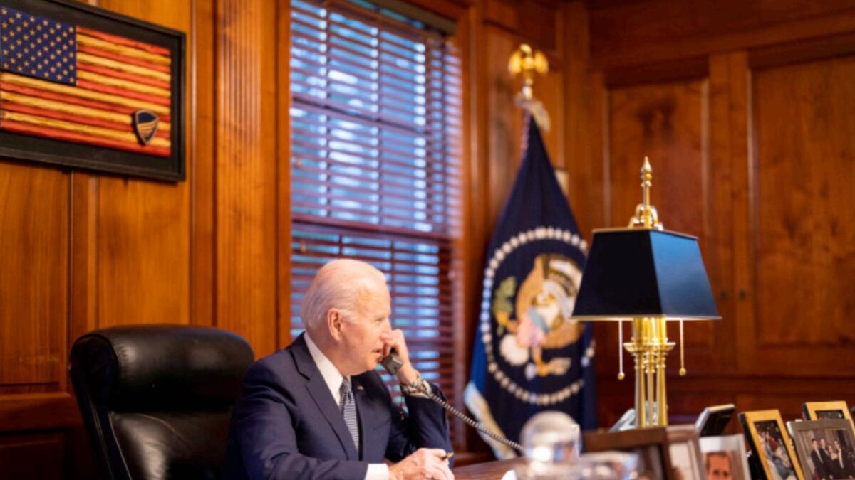 In this image provided by The White House, President Joe Biden speaks with Russian President Vladimir Putin on the phone from his private residence in Wilmington. — AP