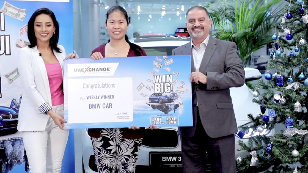 Filipina maid wins BMW luxury car in UAE raffle