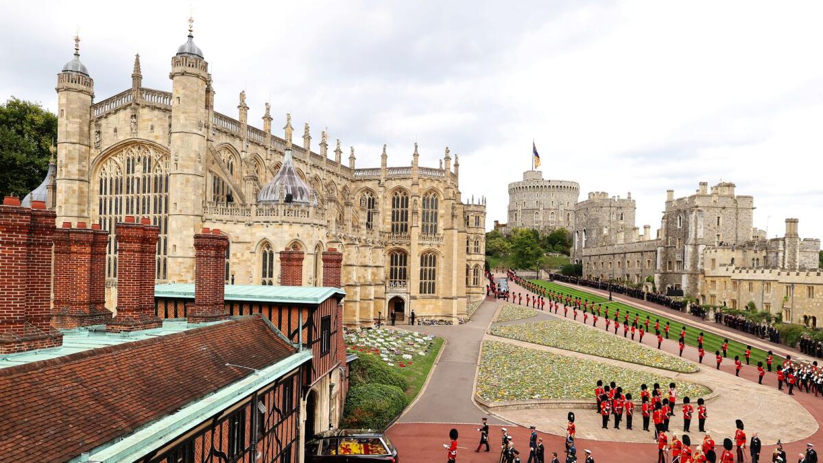 The Royal State Hearse carrying the Queen's coffin arrives at Windsor Castle for the Committal Service.