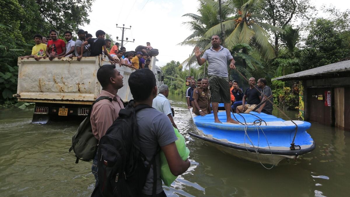 Cyclone aims for Bangladesh as flood toll rises to 164 in Sri Lanka