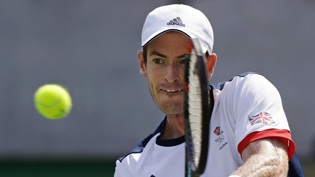 Great Britain’s Andy Murray plays a return to Juan Monaco of Argentina during their match on Tuesday. — AP