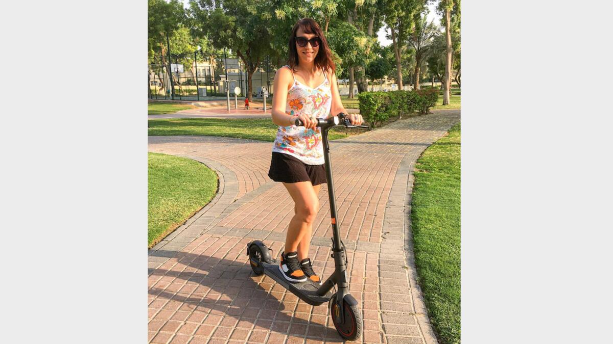 Ana says the E-scooter makes her commute to work easy.