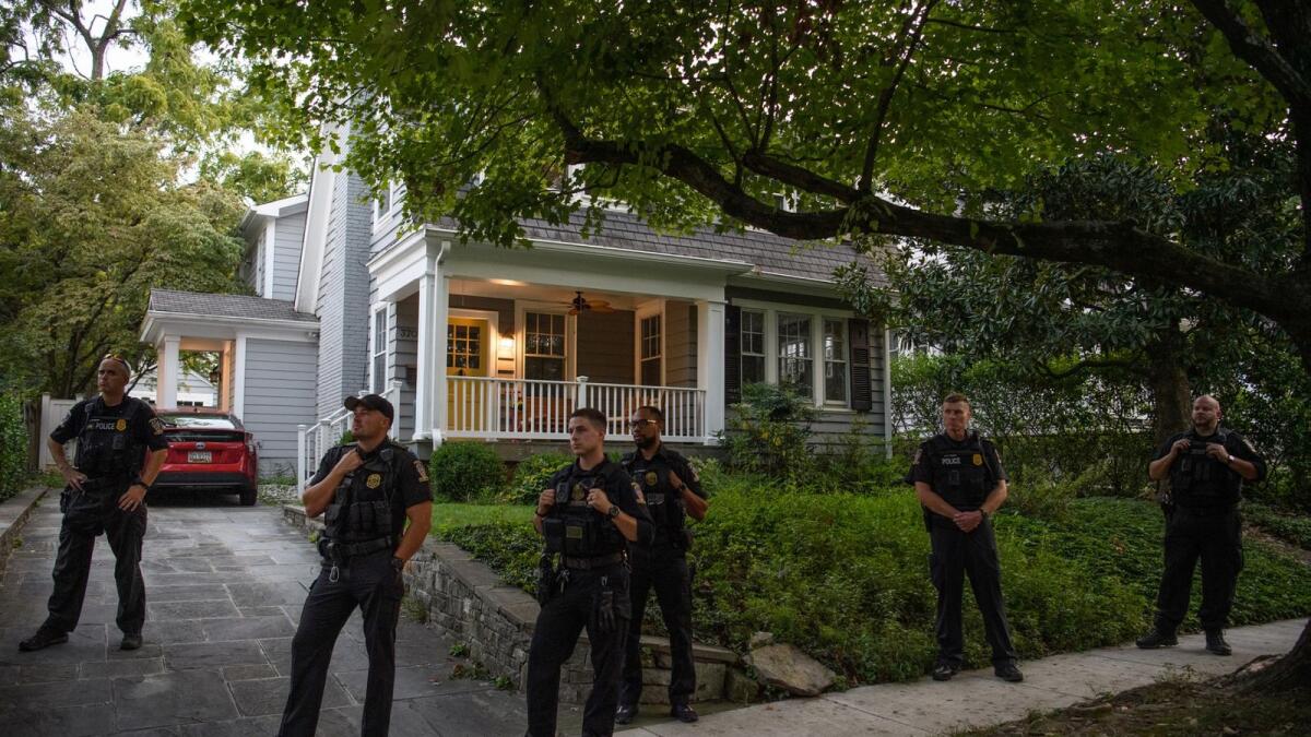 Police stand guard near the house of US Supreme Court Justice Brett Kavanaugh in Chevy Chase Maryland. AFP