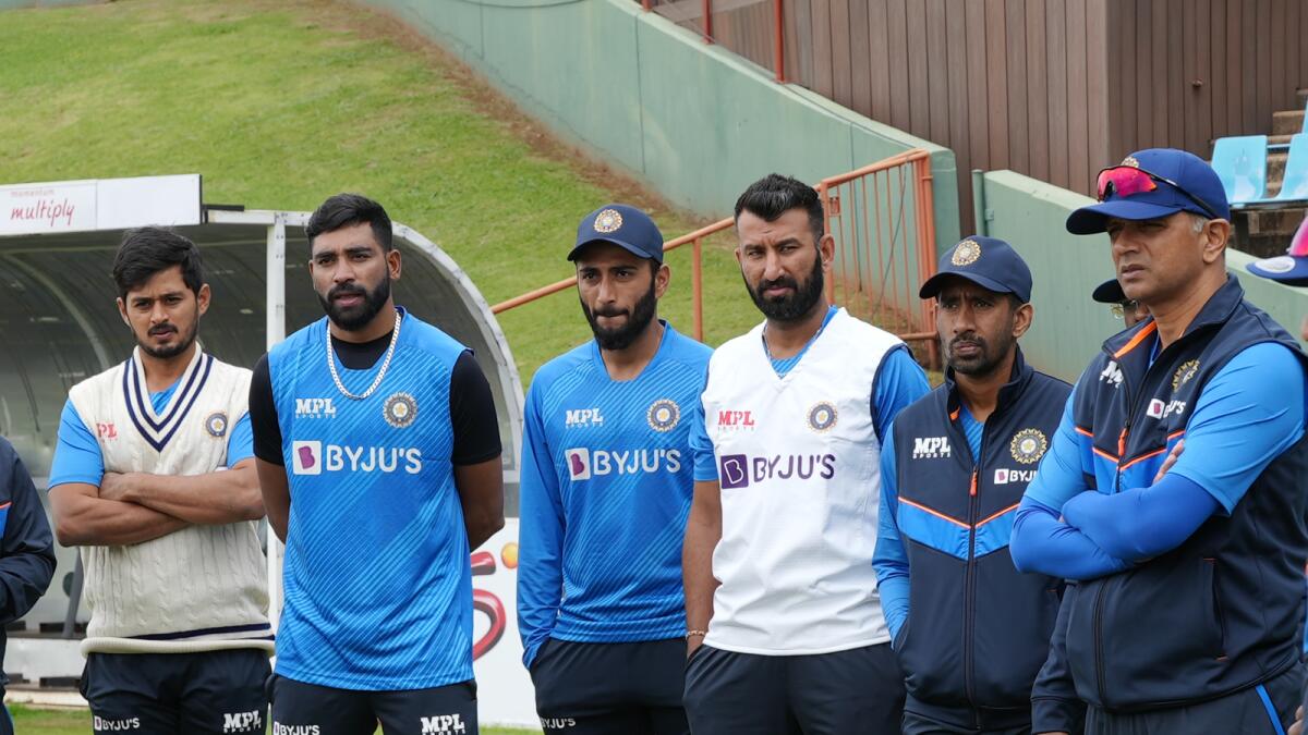 Cheteshwar Pujara (third from right) with head coach Rahul Dravid and other players during a practice session on Saturday. (BCCI Twitter)